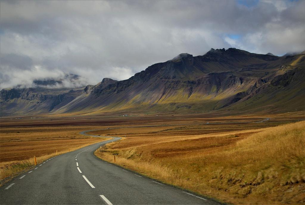 Open dossier with flag and country info